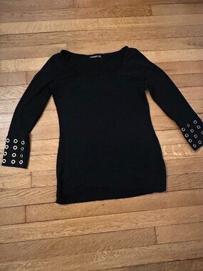 Unique black 3/4 sleeve PattyBoutik top with grommet detail